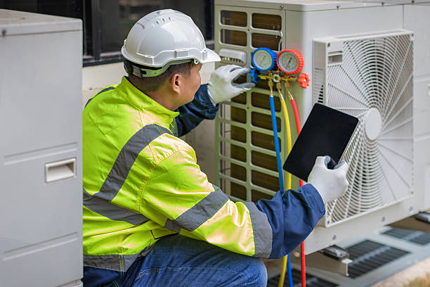 Professional Heat Pump Repair technician working in Goldenrod, FL
